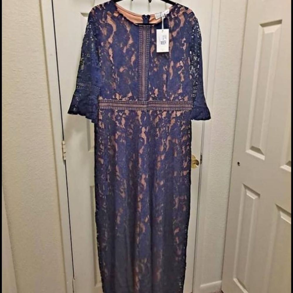 New with tags. Beautiful navy blue lace dress